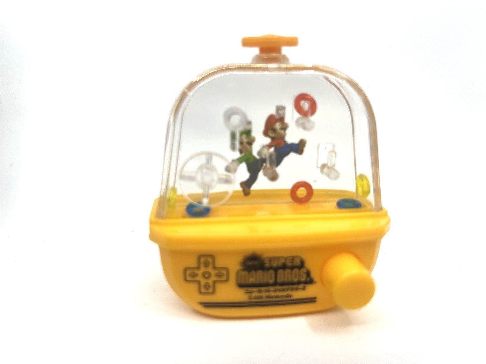 Super Mario Bros. Nintendo DS Gatchapon Mini Water Toy Game Yellow