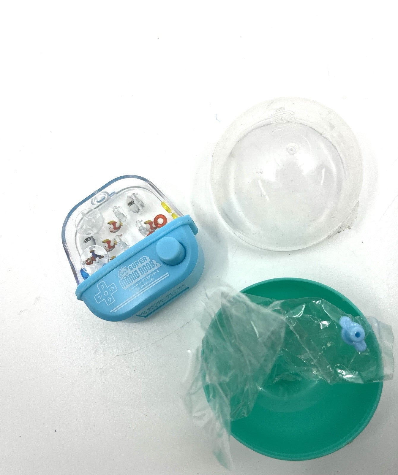 Super Mario Bros. Nintendo DS Gatchapon Mini Water Toy Game Blue